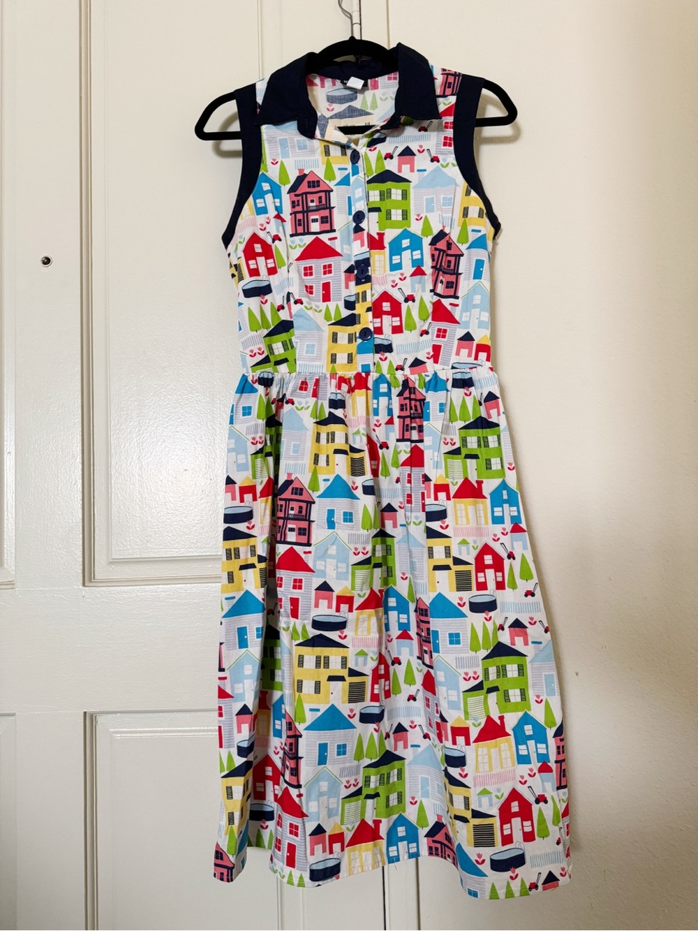 Retrolicious Sleeveless Shirt Dress in Navy with Multicolor House Print